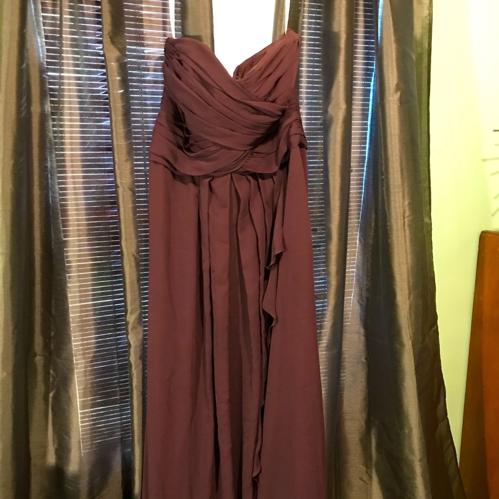 David’s Bridal size 14. Purple strapless dress.